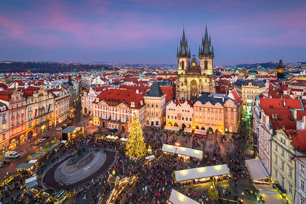 Christmas market in Prague, Czech Republic during sunset by Michael Abid