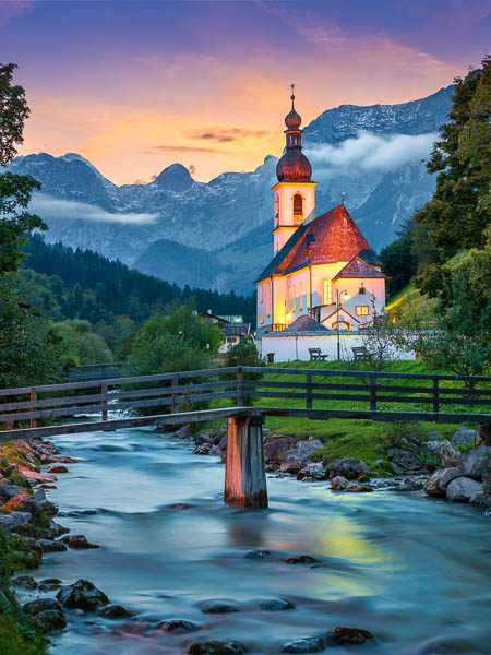 Church of Ramsau in Berchtesgadener Land in Bavaria, Germany during sunset by Michael Abid