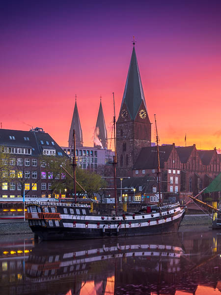 Schlachte in Bremen, Germany at sunrise with old sailing ship on Weser river by Michael Abid