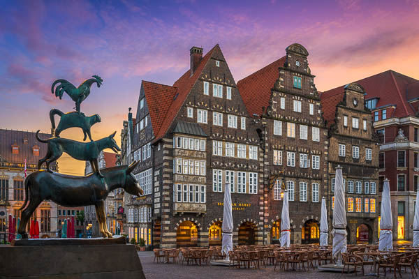 Famous statue of the Town Musicians in the old town of Bremen, Germany by Michael Abid