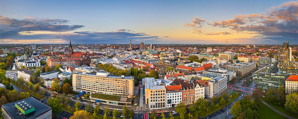 Panoramic skyline view of Hannover, Germany at sunset by Michael Abid