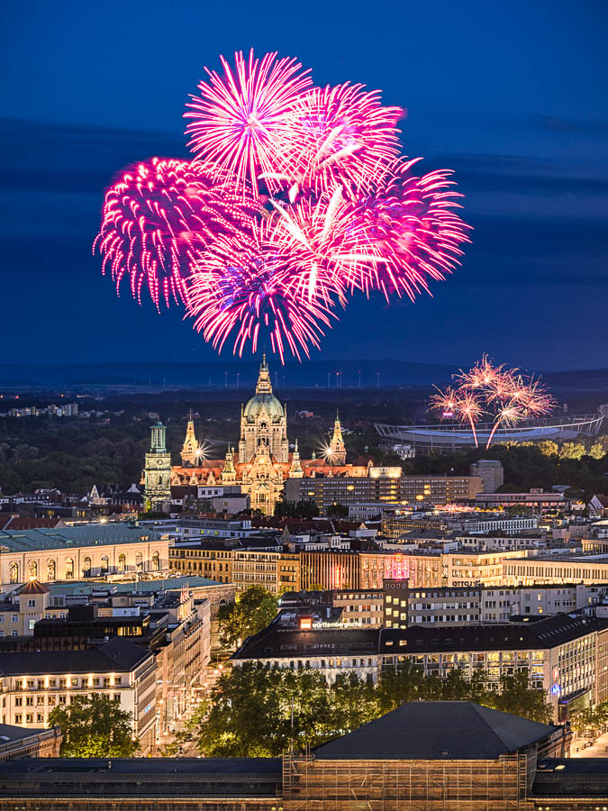 Skyline of Hannover at night with fireworks
