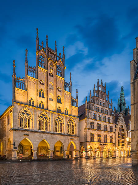 Town Hall on the Prinzipalmarkt at night in Münster, Germany by Michael Abid
