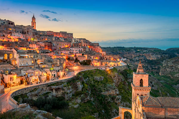 The ancient cave city of Matera in Italy at sunset by Michael Abid