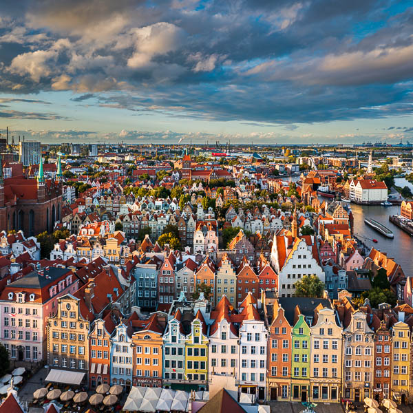 Aerial view of the old town with beautiful colorful buildings in Gdansk, Poland by Michael Abid