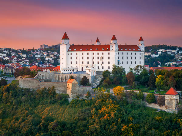 Castle of Bratislava, Slovakia during sunset by Michael Abid