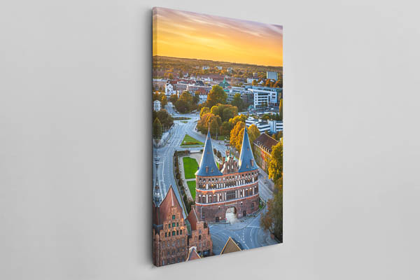 Canvas - Holstentor in Lübeck during autumn sunset