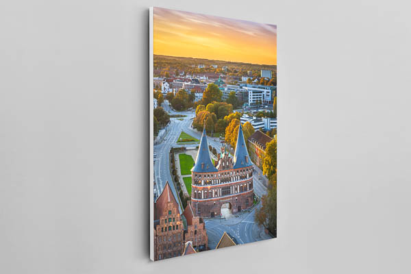 Canvas - Holstentor in Lübeck during autumn sunset