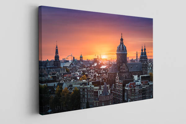 Leinwand - Sonnenuntergang über der historischen Stadt von Amsterdam