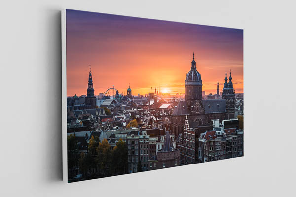 Leinwand - Sonnenuntergang über der historischen Stadt von Amsterdam